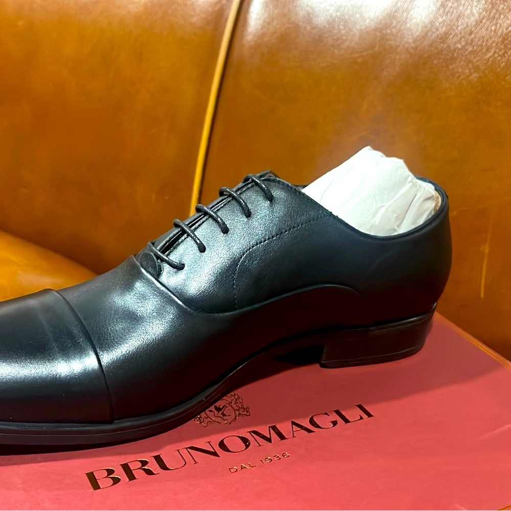 A handcrafted Balmoral cap toe oxford. Fully Italian leather lined.